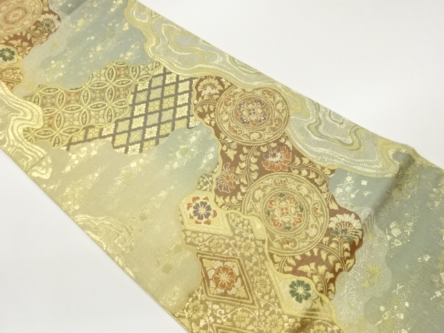 道長取りに華紋・花唐草・色紙散らし模様織出し袋帯